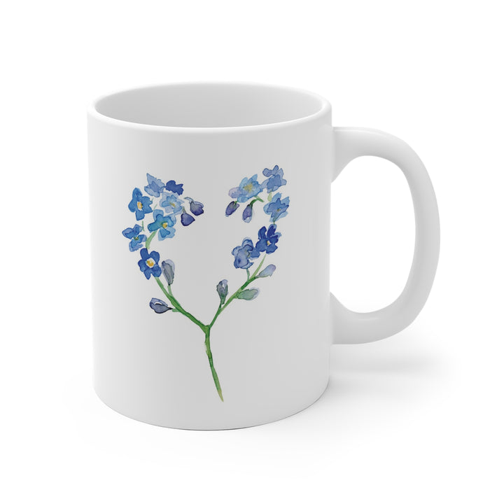 Blue flowers in heart shape by Michelle Dujardin