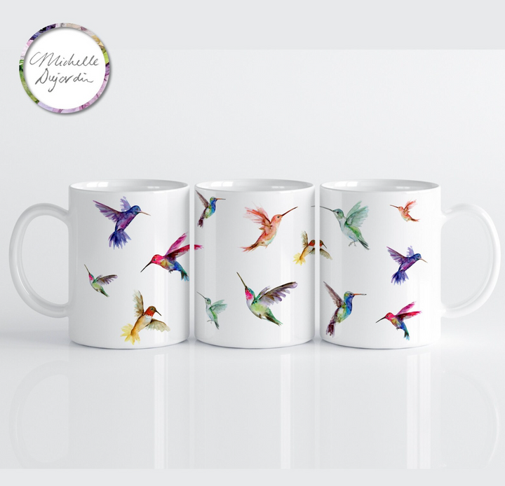 Ceramic cup with flying hummingbirds watercolours by Michelle Dujardin