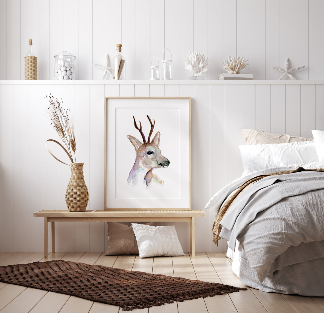Roe deer artwork in frame in bedroom interior