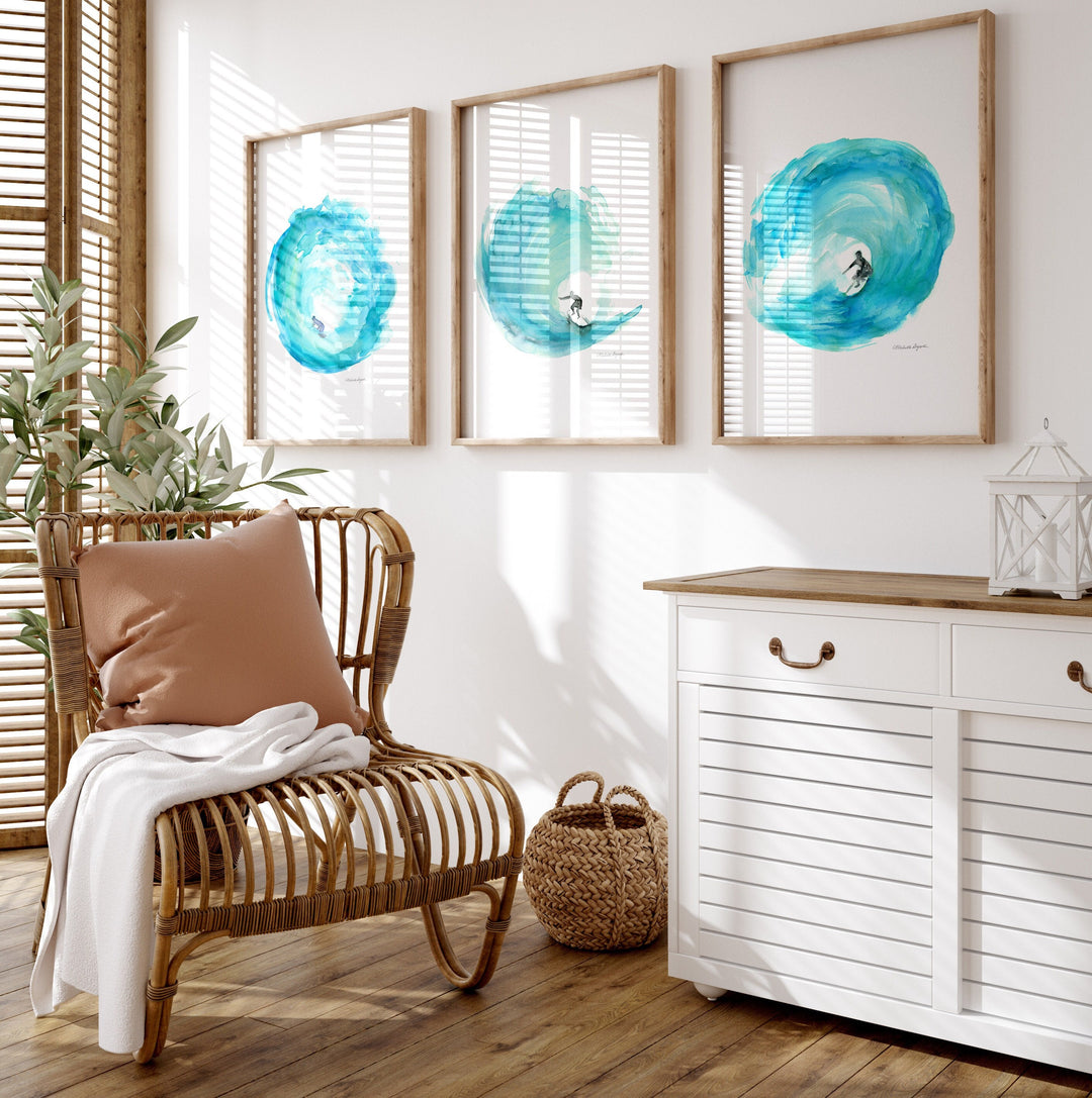 Teal colored wave watercolor prints with surfer silhouettes painted by Michelle Dujardin