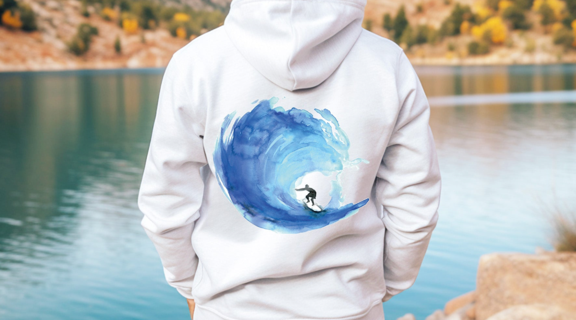 White hoodie with blue wave and surfer watercolor print by Michelle Dujardin