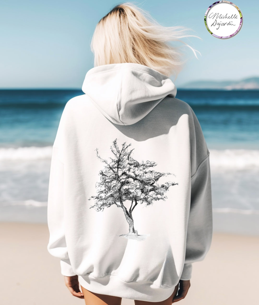 White hoodie with grey pencil drawing of a tree n the back