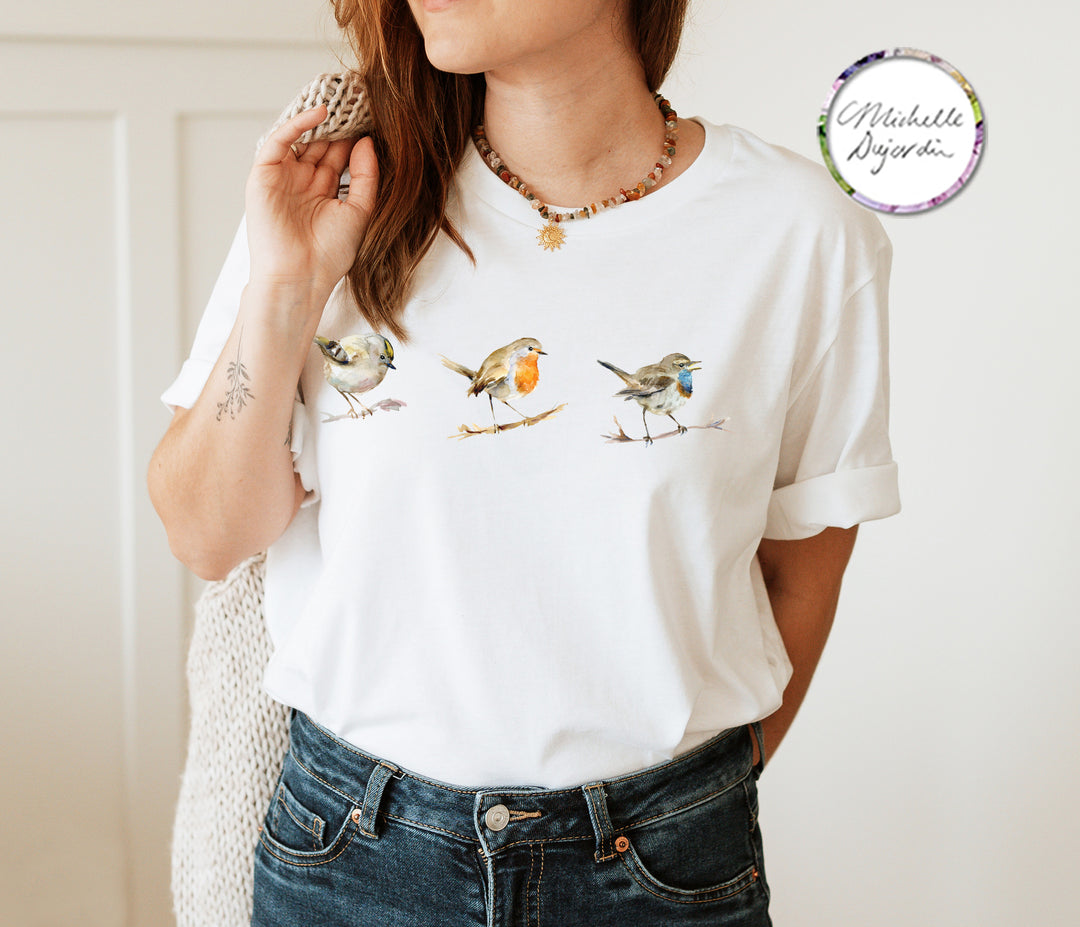 White t-shirt with small bird watercolors by Michelle Dujardin