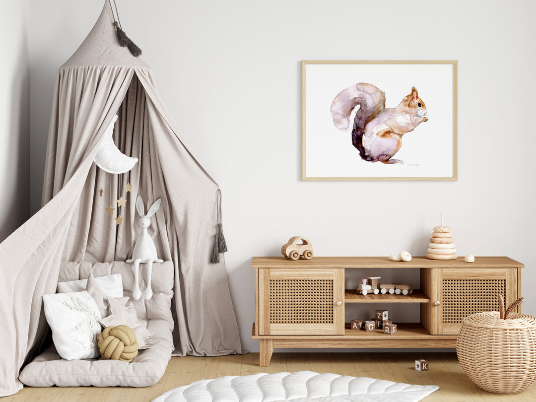 Nursery interior with pinkish squirrel on the wall