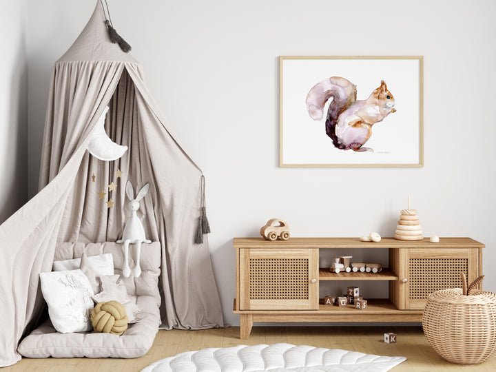 Nursery interior with pinkish squirrel on the wall