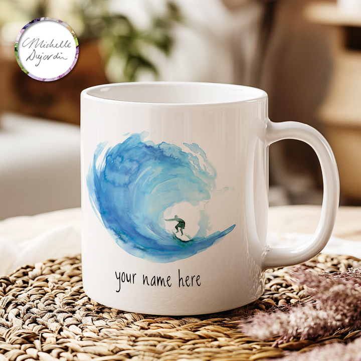 Custom name mug with blue wave watercolor and surfer by Michelle Dujardin