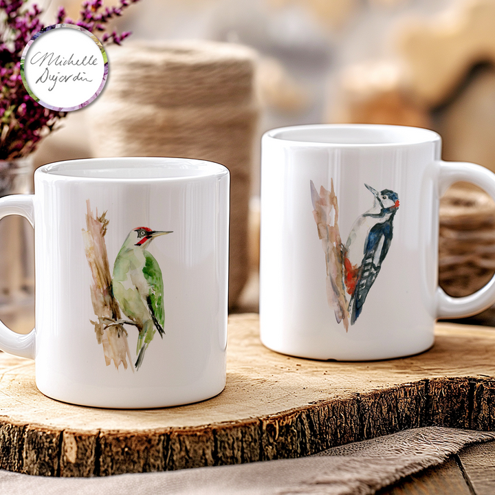 Ceramic mug with 3 woodpecker species in watercolor by Michelle Dujardin