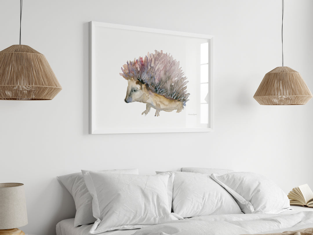Framed artwork of a hedgehog above a bed in a bedroom.