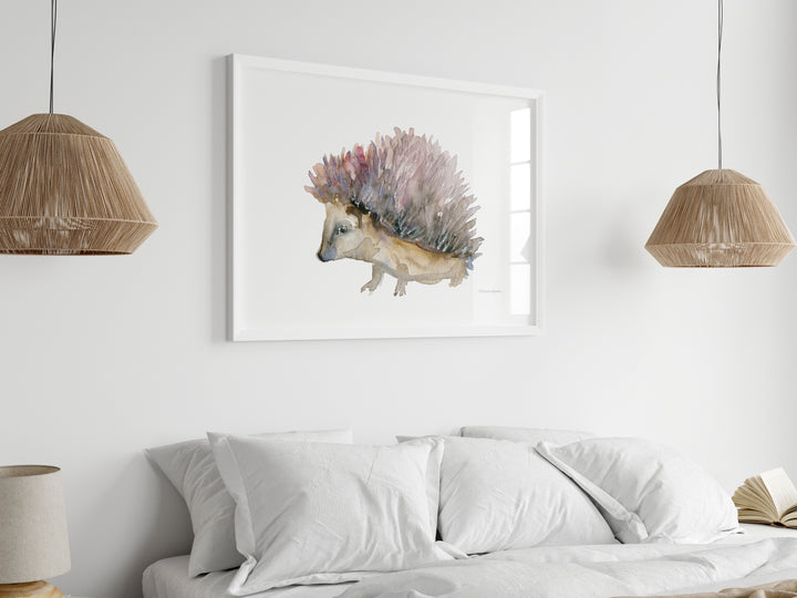 Framed artwork of a hedgehog above a bed in a bedroom.