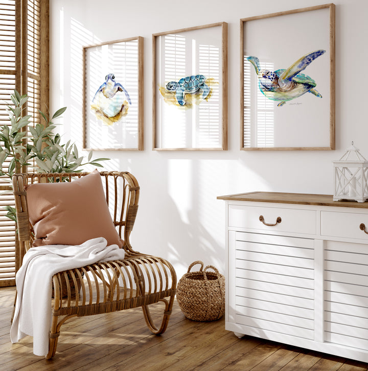 Beach house Living room with wicker chair, white cabinet, and framed turtle artwork on the wall.