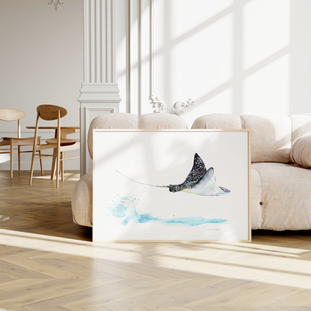 Framed artwork of a manta ray on a wall in a modern living room.
