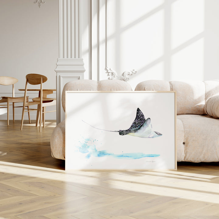 Framed artwork of a manta ray on a wall in a modern living room.