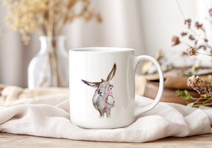 witte mok met ezel aquarel illustratie en decoratie op tafel