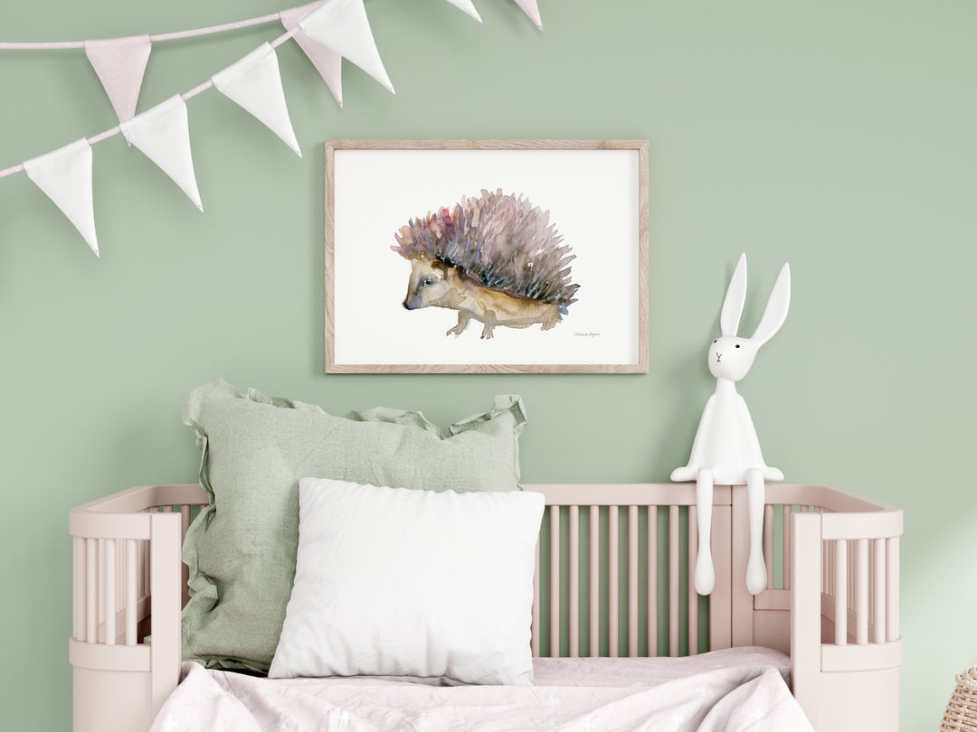 Children's room with a crib, framed artwork of a hedgehog, and a bunny plush toy on a light green wall.