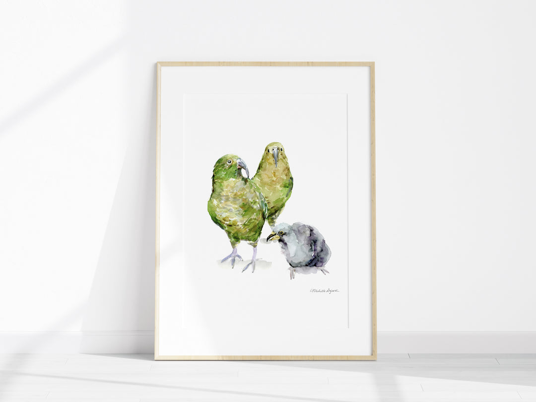 Framed artwork of two parrots on a white background