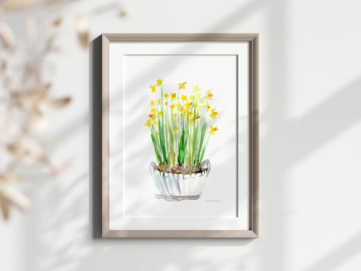 Schilderij van narcissen in mand in lijstje aan de muur