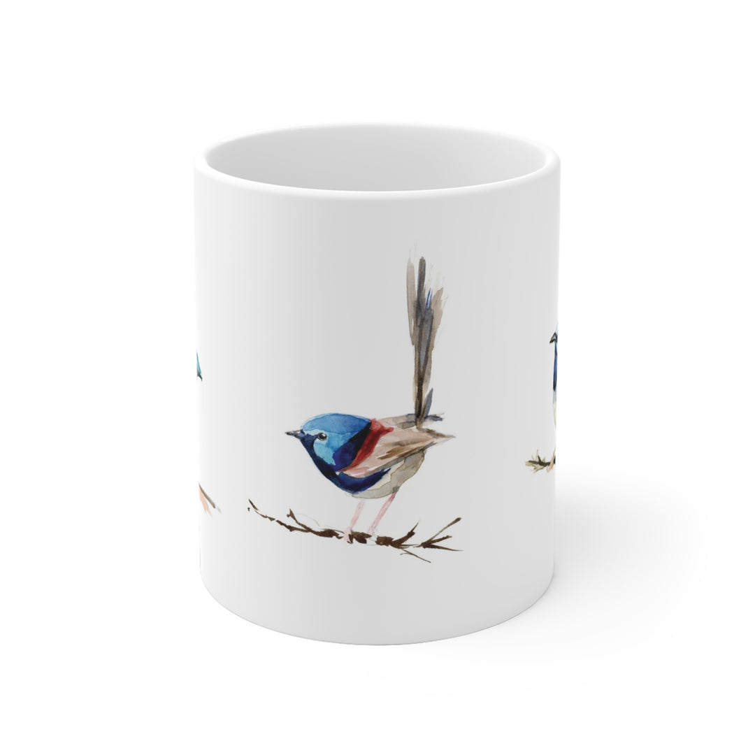 White mug with a bird design on a white background