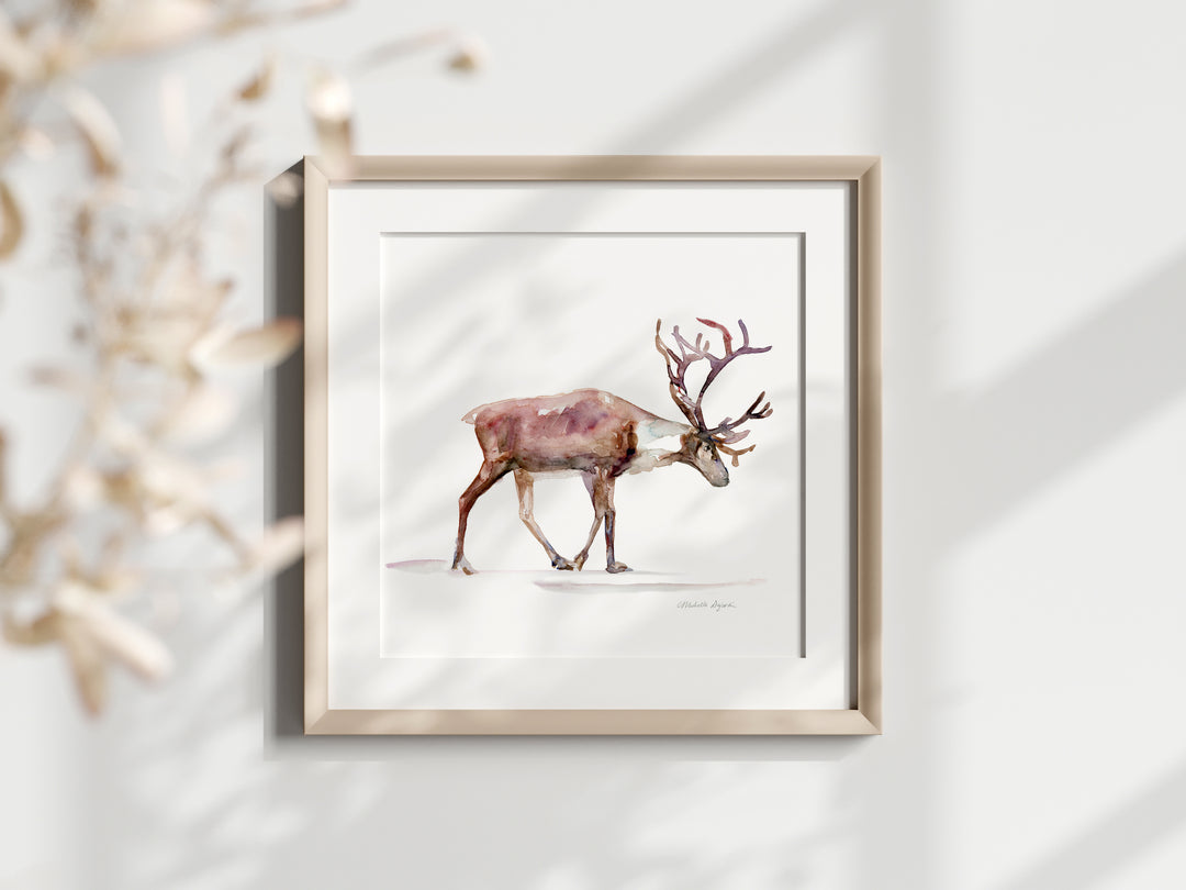 Framed artwork of a reindeer on a white background