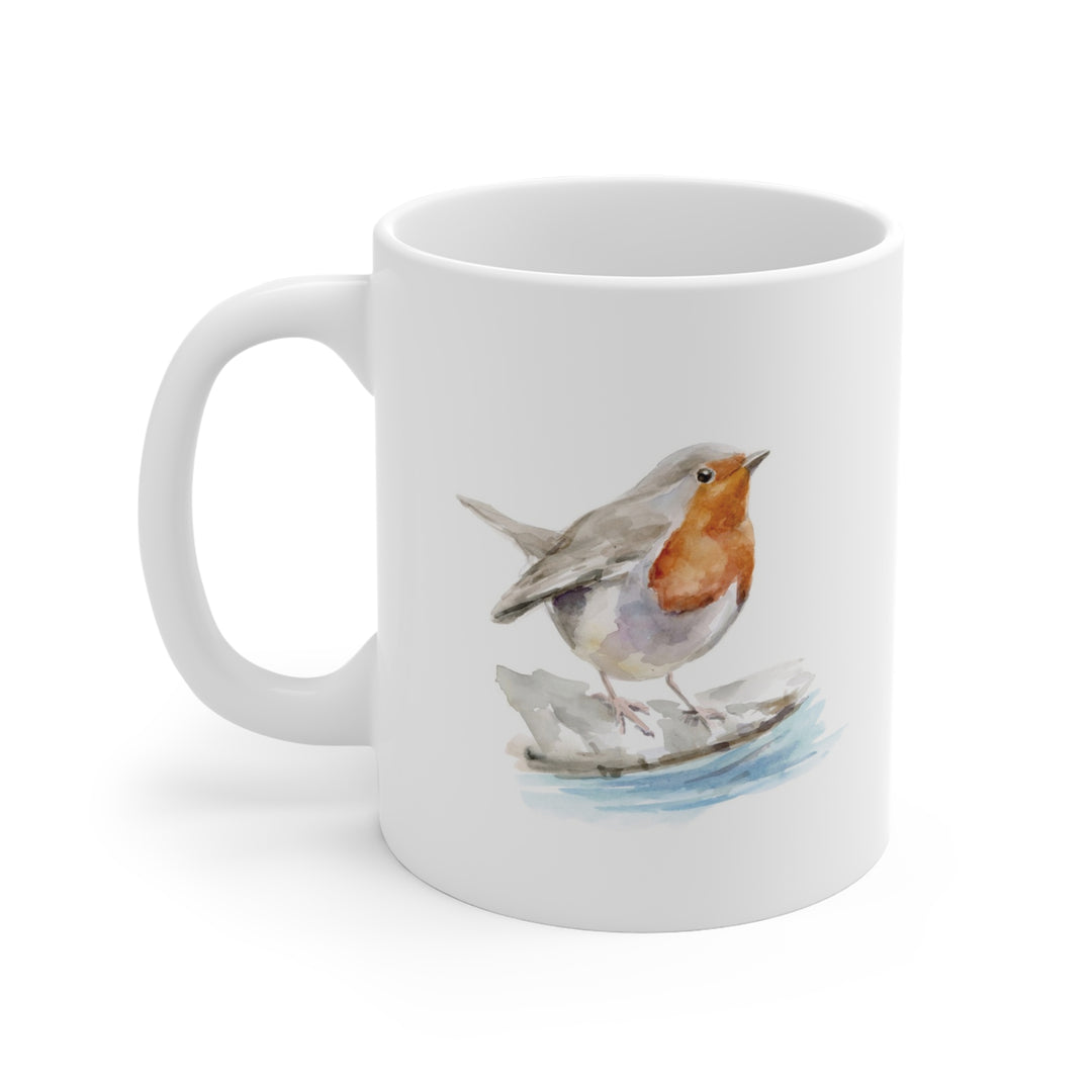 Witte drinkbeker met roodborst op witte achtergond