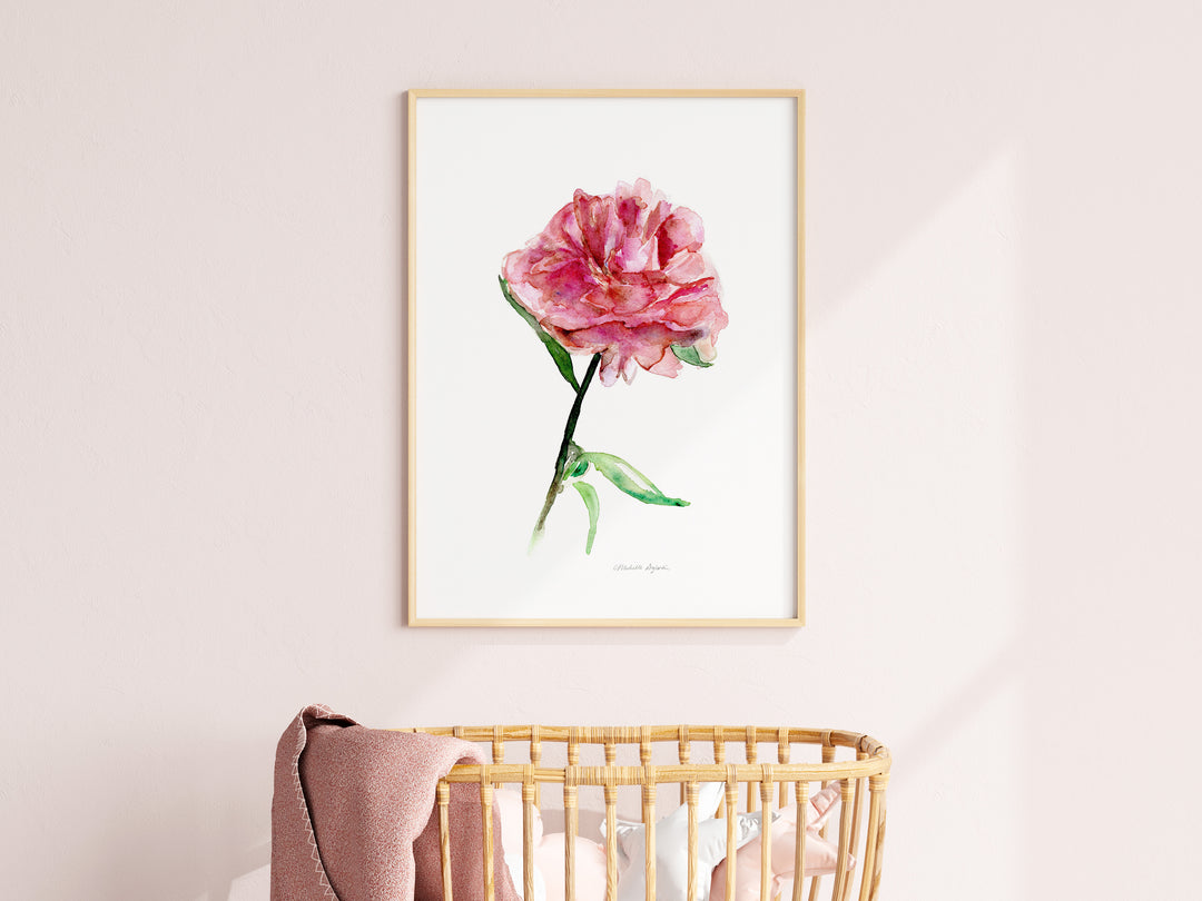 Roos schilderij in groot frame boven wieg van Michelle Dujardin