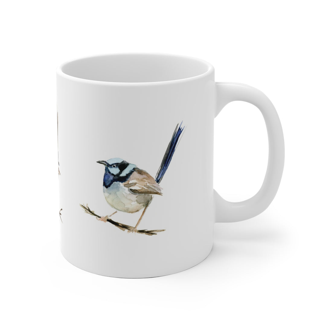 White mug with a bird design on a white background